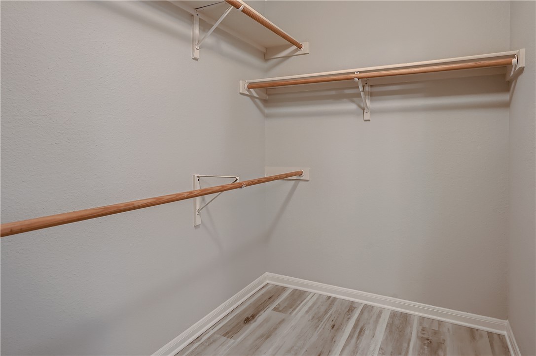 102 Evergreen Circle Georgetown, TX 78626 - Photo 23 of 33 a view of a room with racks on the wall