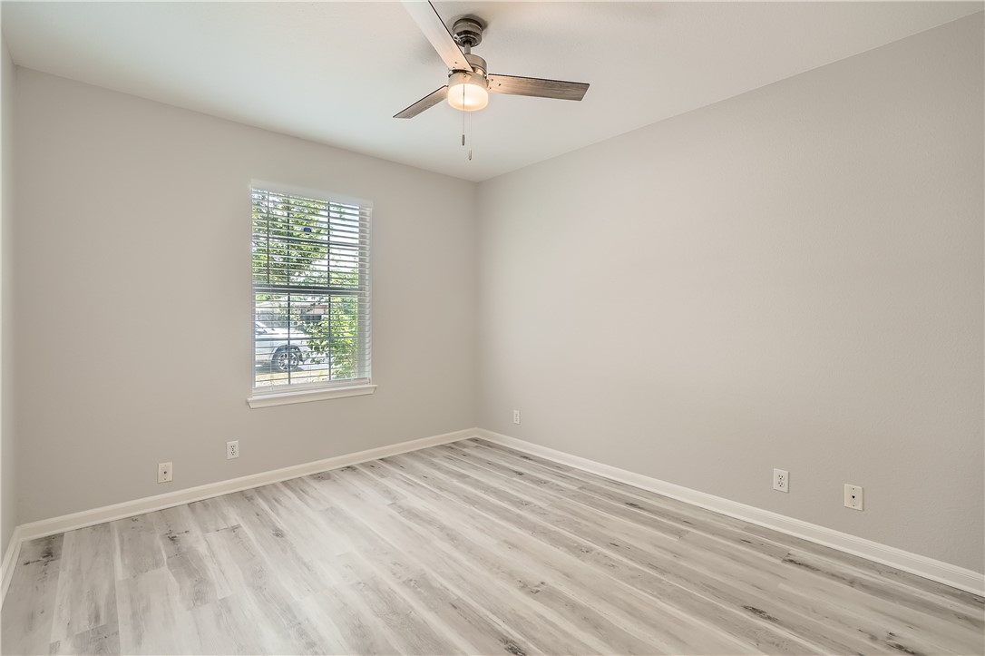 102 Evergreen Circle Georgetown, TX 78626 - Photo 26 of 33 an empty room with a window and a fan