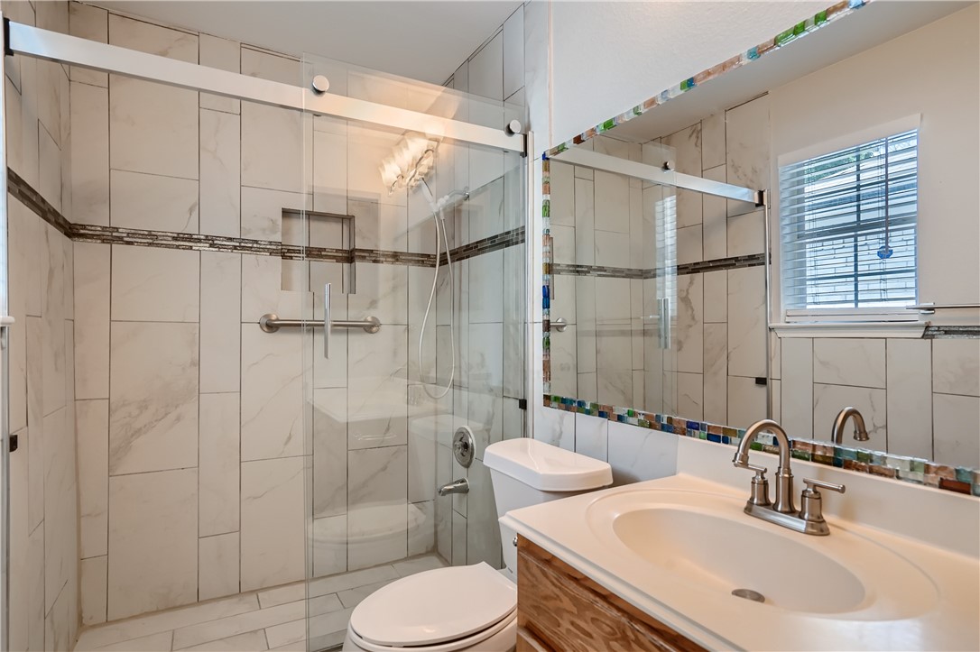 102 Evergreen Circle Georgetown, TX 78626 - Photo 27 of 33 a bathroom with a sink toilet and shower