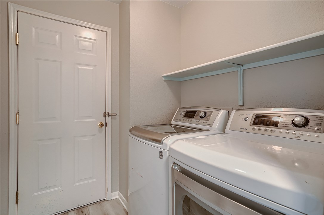 102 Evergreen Circle Georgetown, TX 78626 - Photo 28 of 33 a utility room with dryer and washer