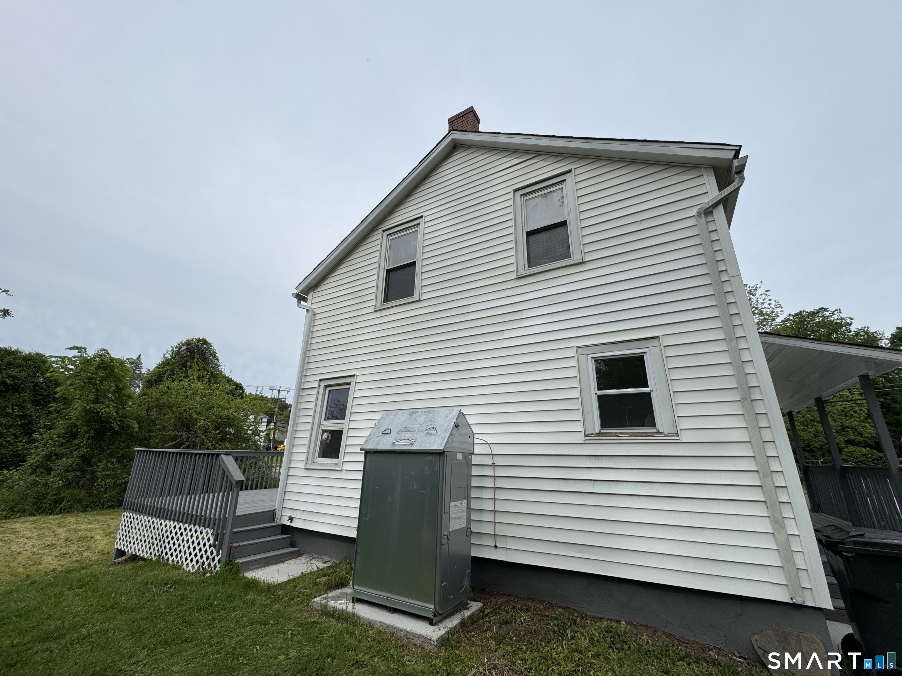 10 Center Street Windsor Locks, CT 06096 - Photo 22 of 25 a view of a house with a backyard
