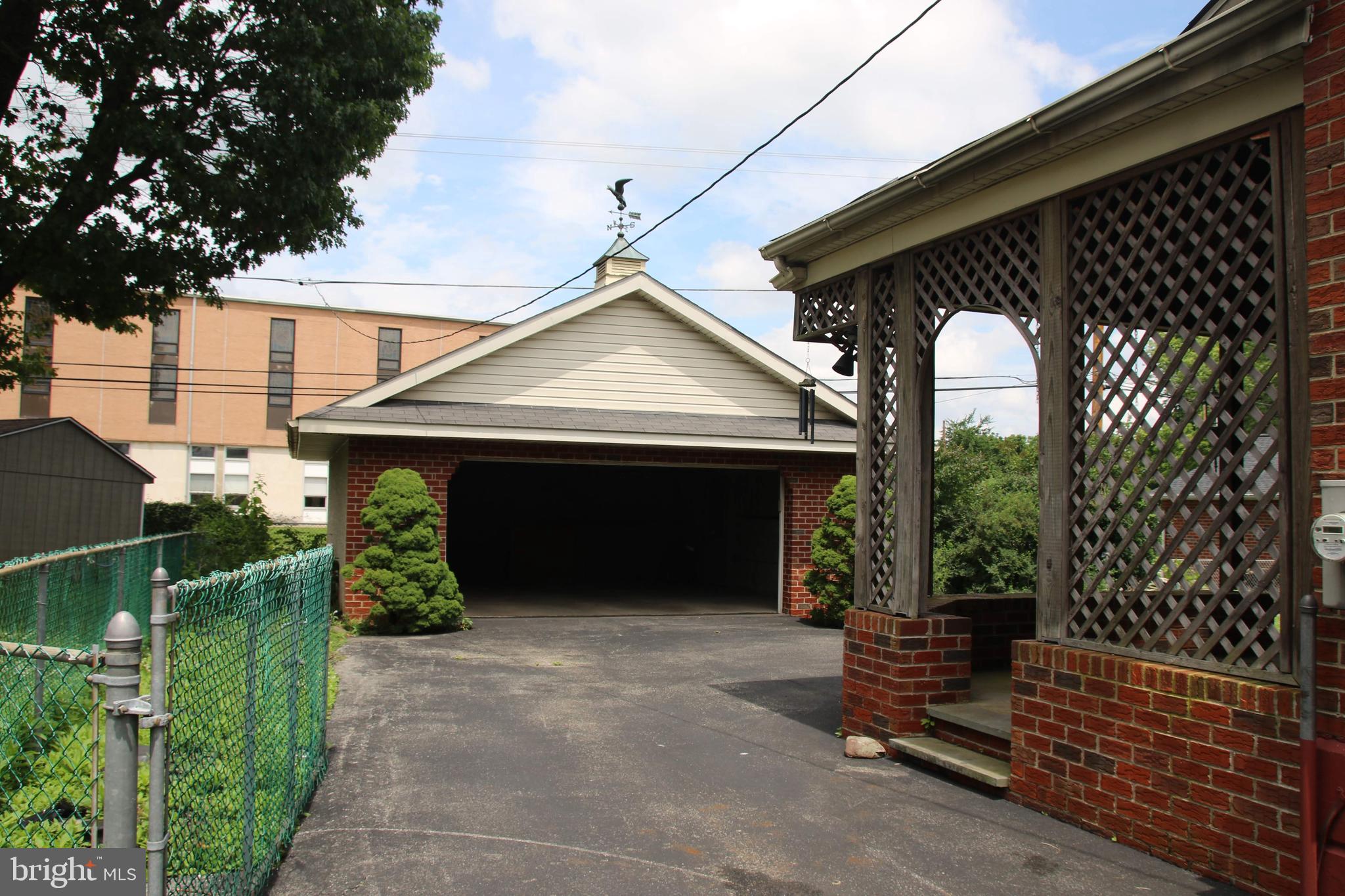 403 Pinecrest Road Norristown, PA 19403 - Photo 24 of 40 Driveway leading to garage and back yard