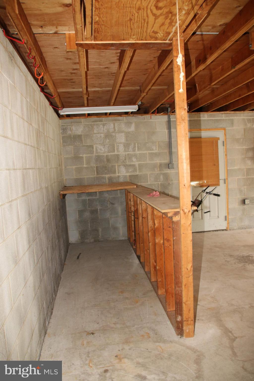 403 Pinecrest Road Norristown, PA 19403 - Photo 35 of 40 Garage with steps to above-garage storage