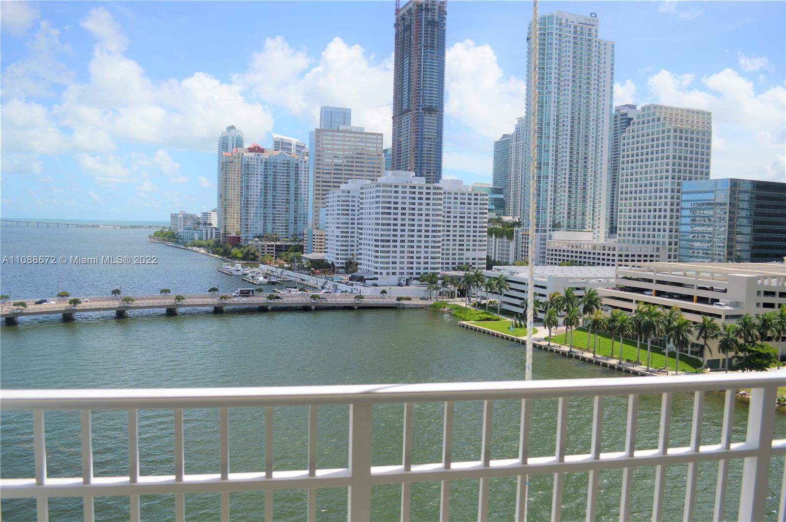 a view of a city with tall buildings