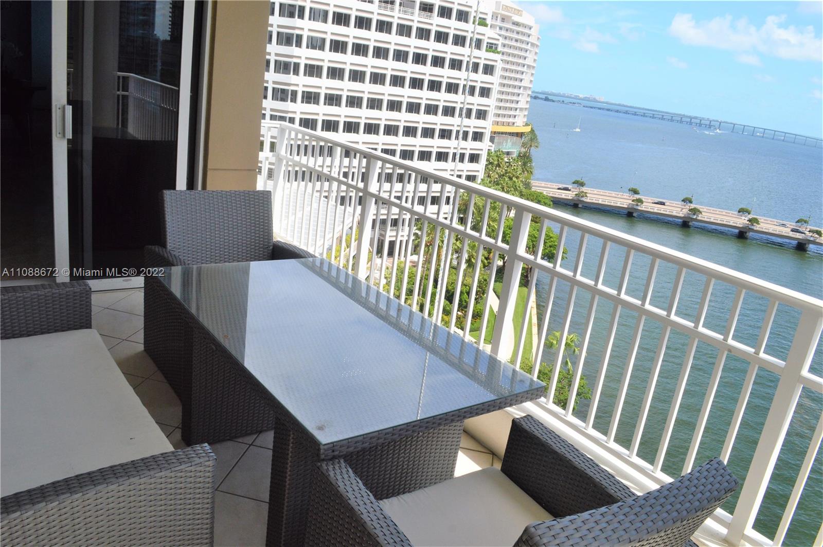 701 Brickell Key Boulevard, Unit 1203 Miami, FL 33131 - Photo 25 of 34 a view of a balcony with chair