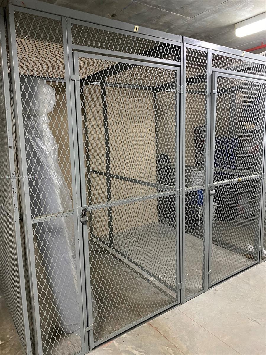 701 Brickell Key Boulevard, Unit 1203 Miami, FL 33131 - Photo 34 of 34 a view of a door with wooden floor