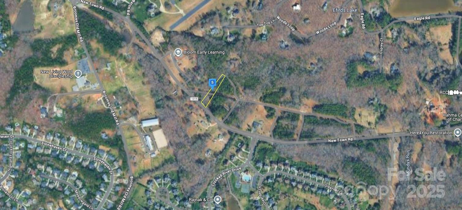 7455 New Town Road Waxhaw, NC 28173 - Photo 3 of 6 a view of a lake view