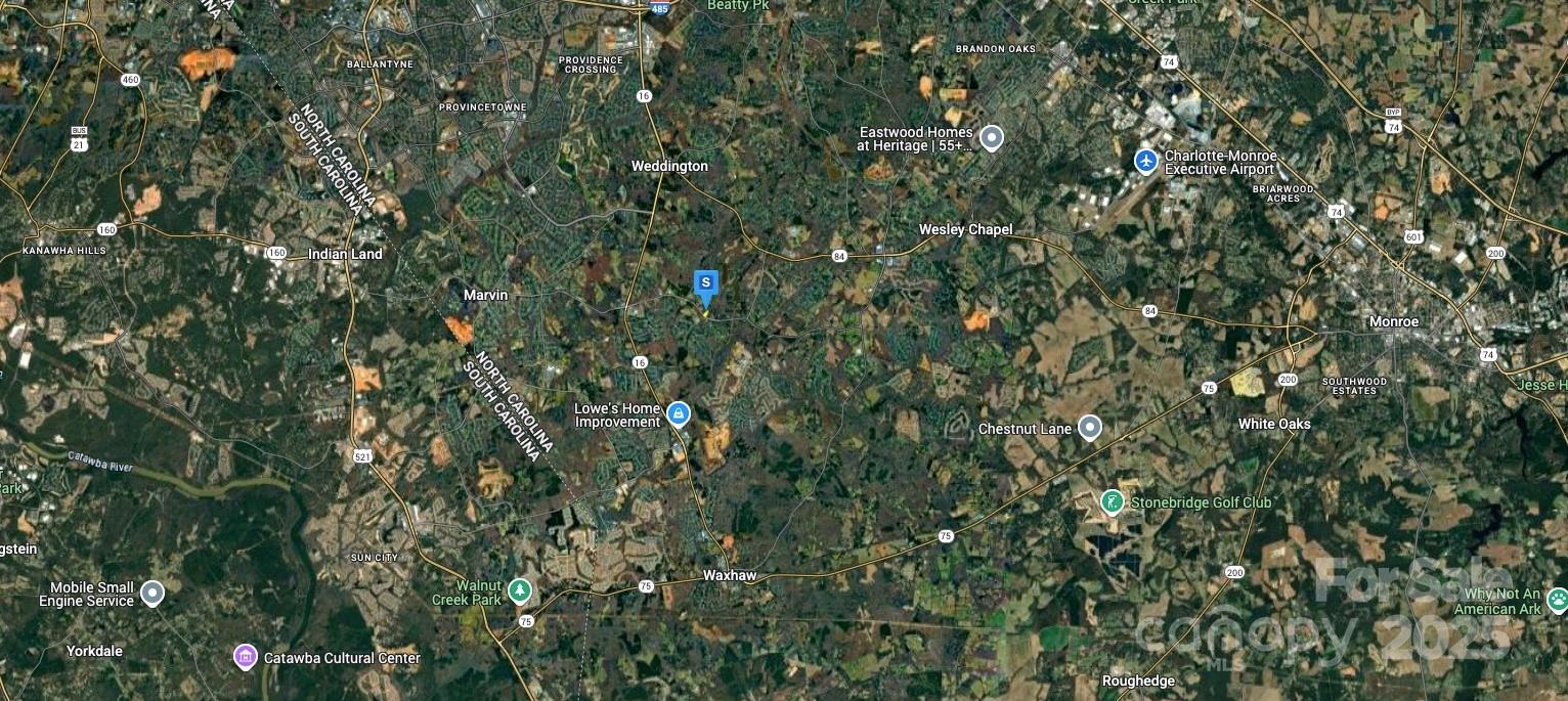 7455 New Town Road Waxhaw, NC 28173 - Photo 5 of 6 a view of a tree