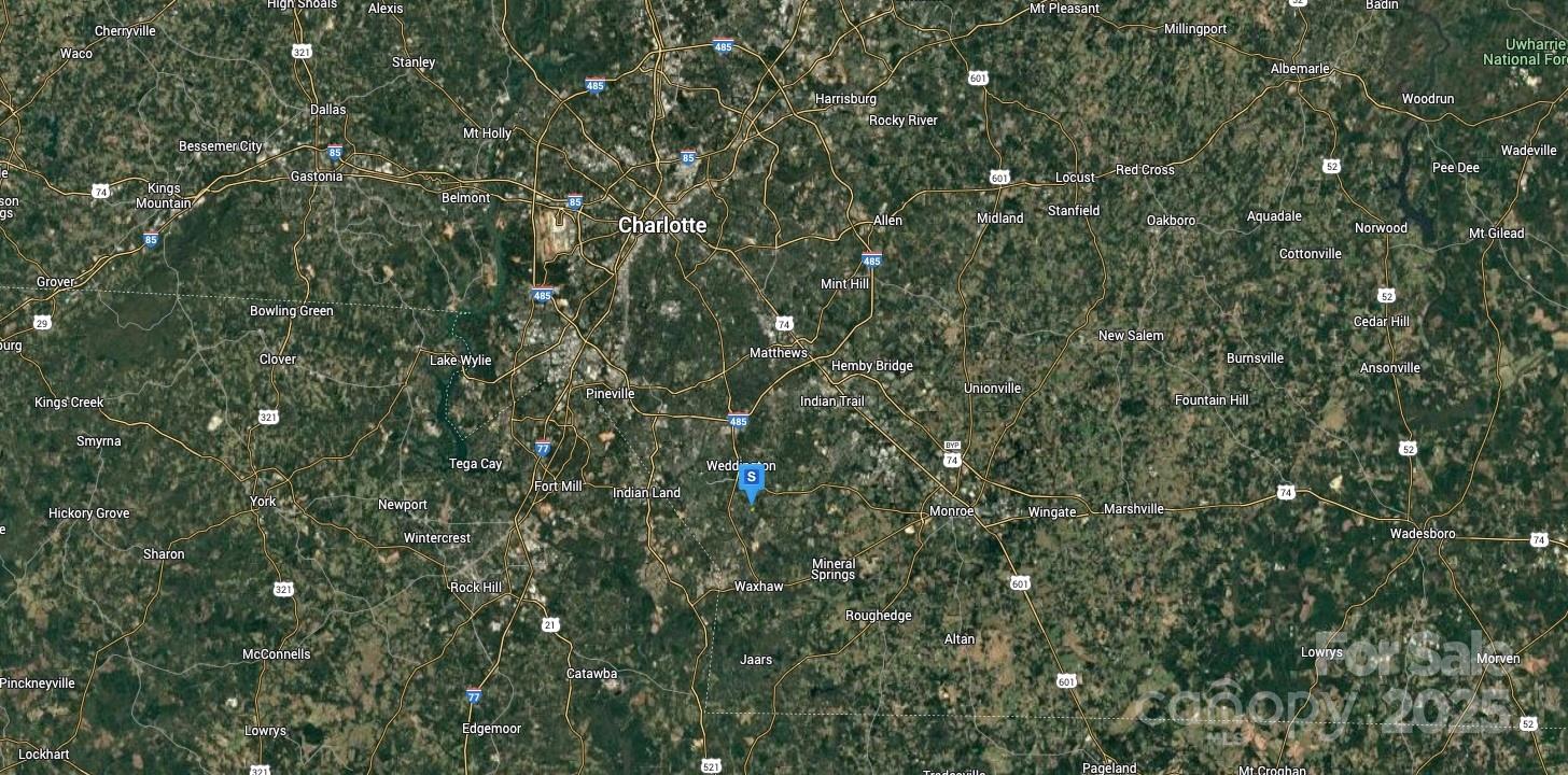 7455 New Town Road Waxhaw, NC 28173 - Photo 6 of 6 a view of a lush green forest