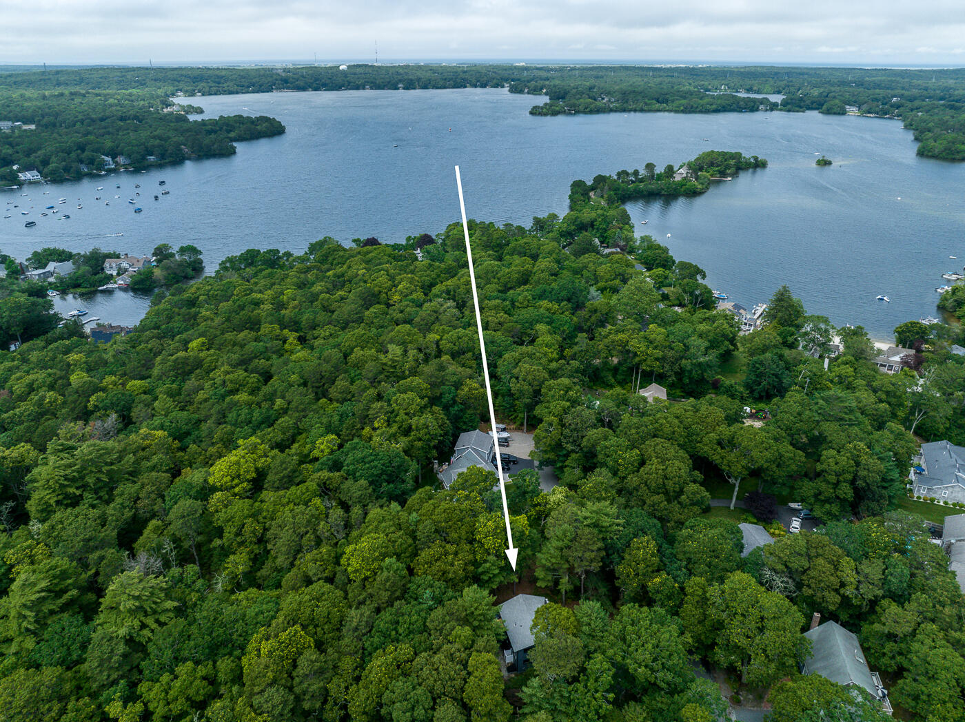 25 Hayes Road Centerville, MA 02632 - Photo 28 of 29 an aerial view of a house with a yard and lake view