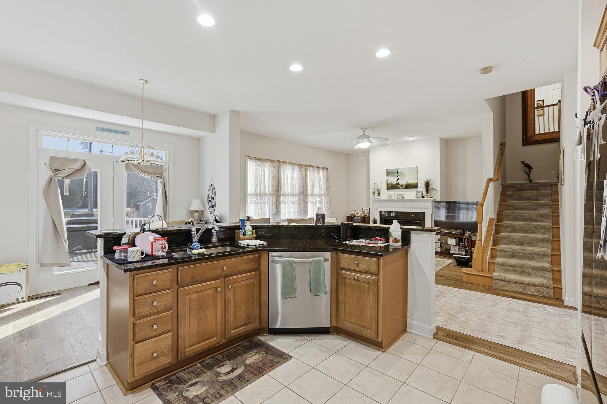 40 Branson Cove Road Hague, VA 22469 - Photo 13 of 51 a kitchen with a sink stove and cabinets