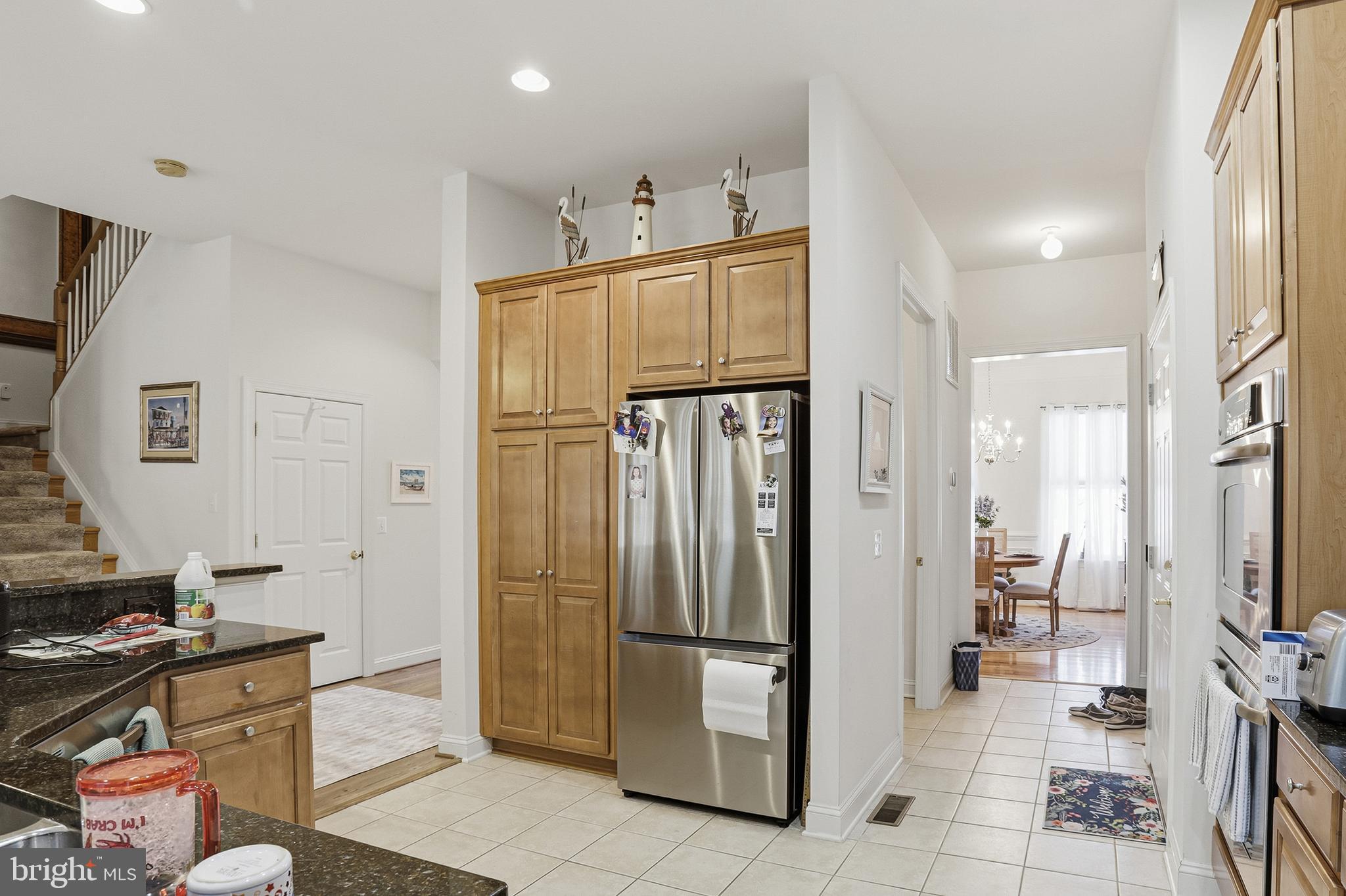40 Branson Cove Road Hague, VA 22469 - Photo 15 of 51 a kitchen with stainless steel appliances a refrigerator and a stove top oven