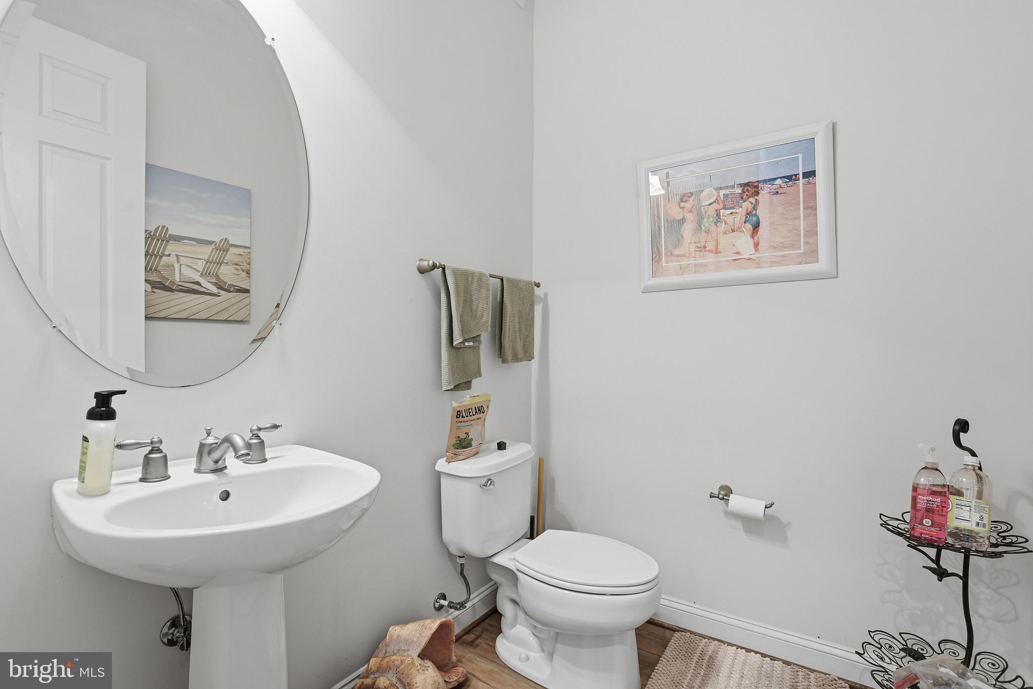 40 Branson Cove Road Hague, VA 22469 - Photo 18 of 51 a bathroom with a sink mirror and toilet