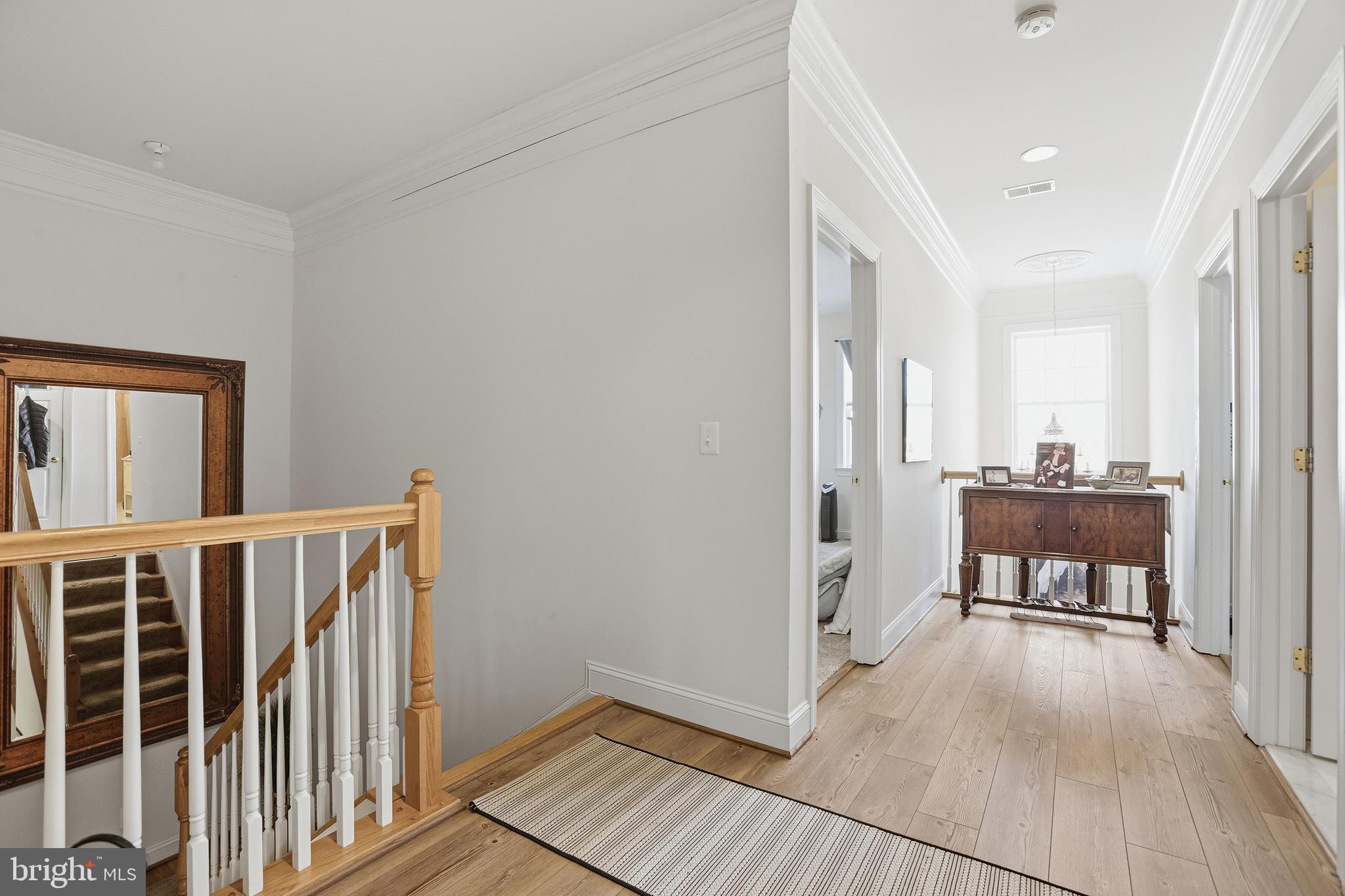 40 Branson Cove Road Hague, VA 22469 - Photo 19 of 51 a view of a hallway with wooden floor and furniture