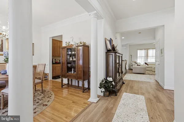 a view of a entryway with furniture and floor to ceiling window