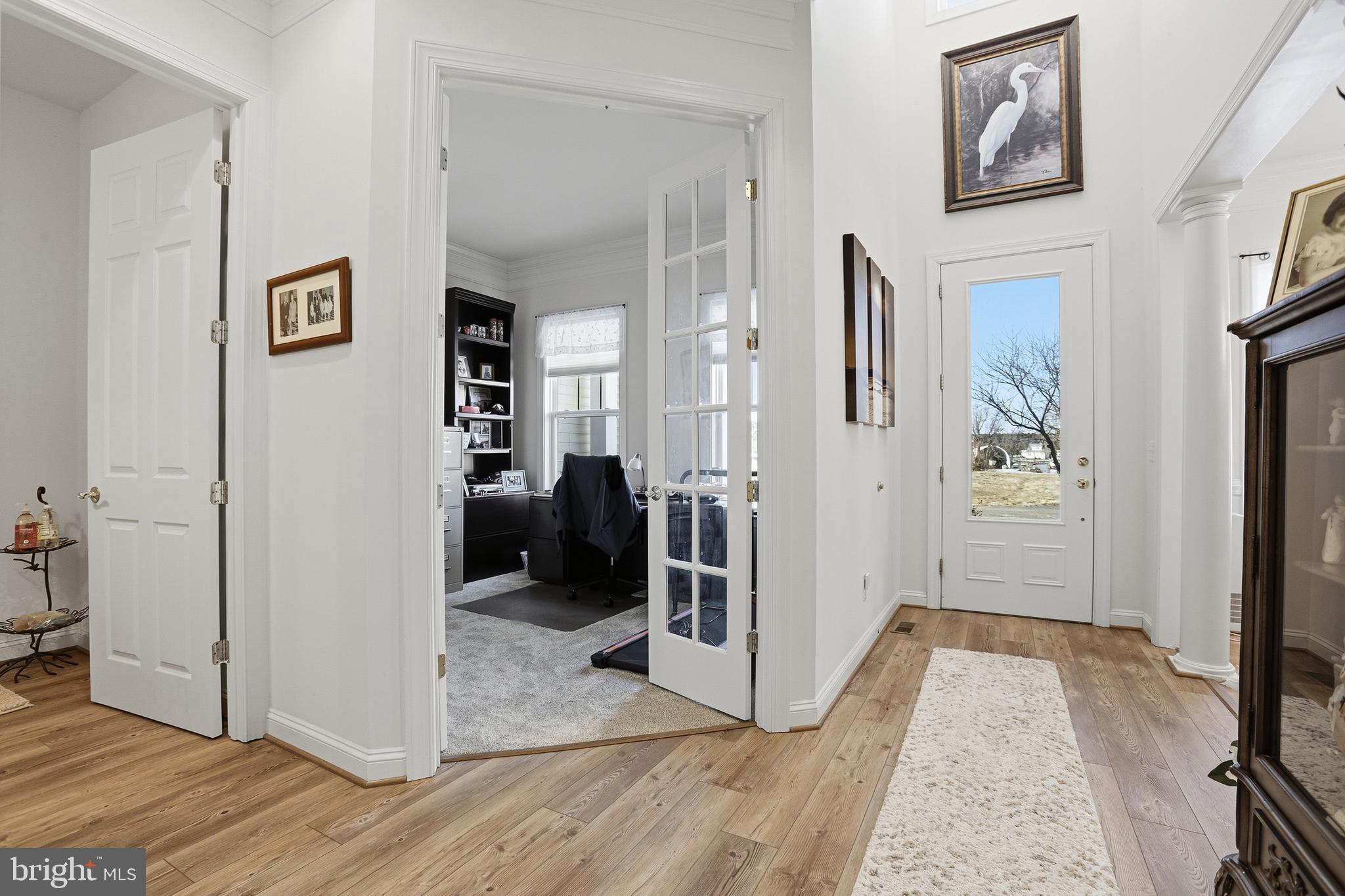 40 Branson Cove Road Hague, VA 22469 - Photo 5 of 51 a view of a hallway view with wooden floor and staircase