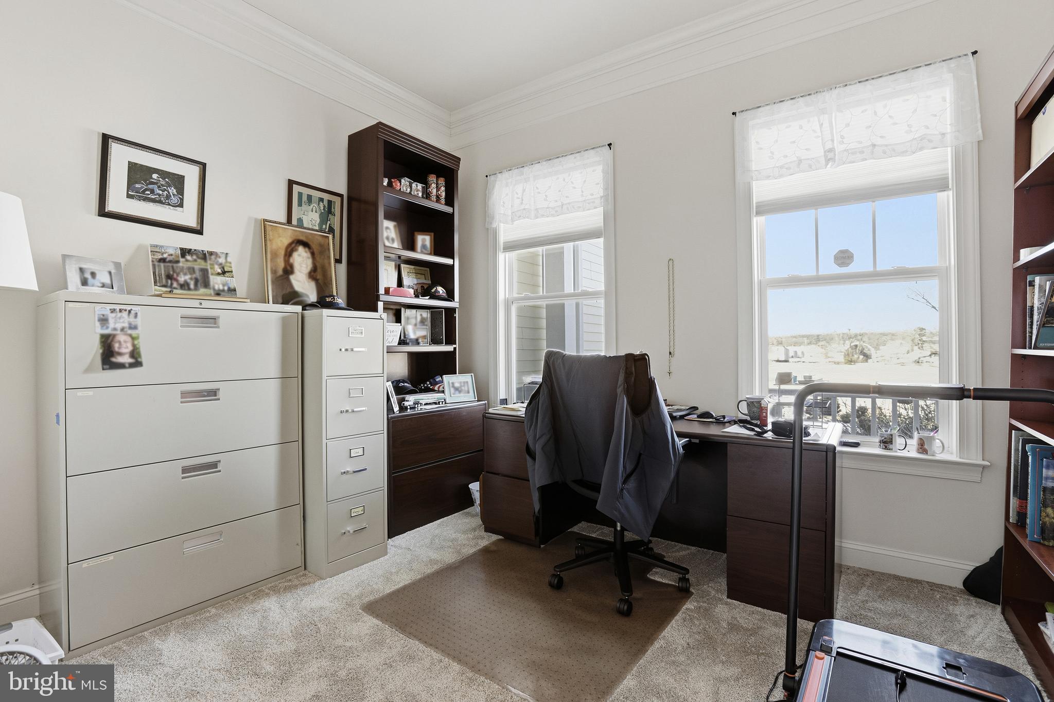 40 Branson Cove Road Hague, VA 22469 - Photo 6 of 51 a view of a workspace with furniture and a window