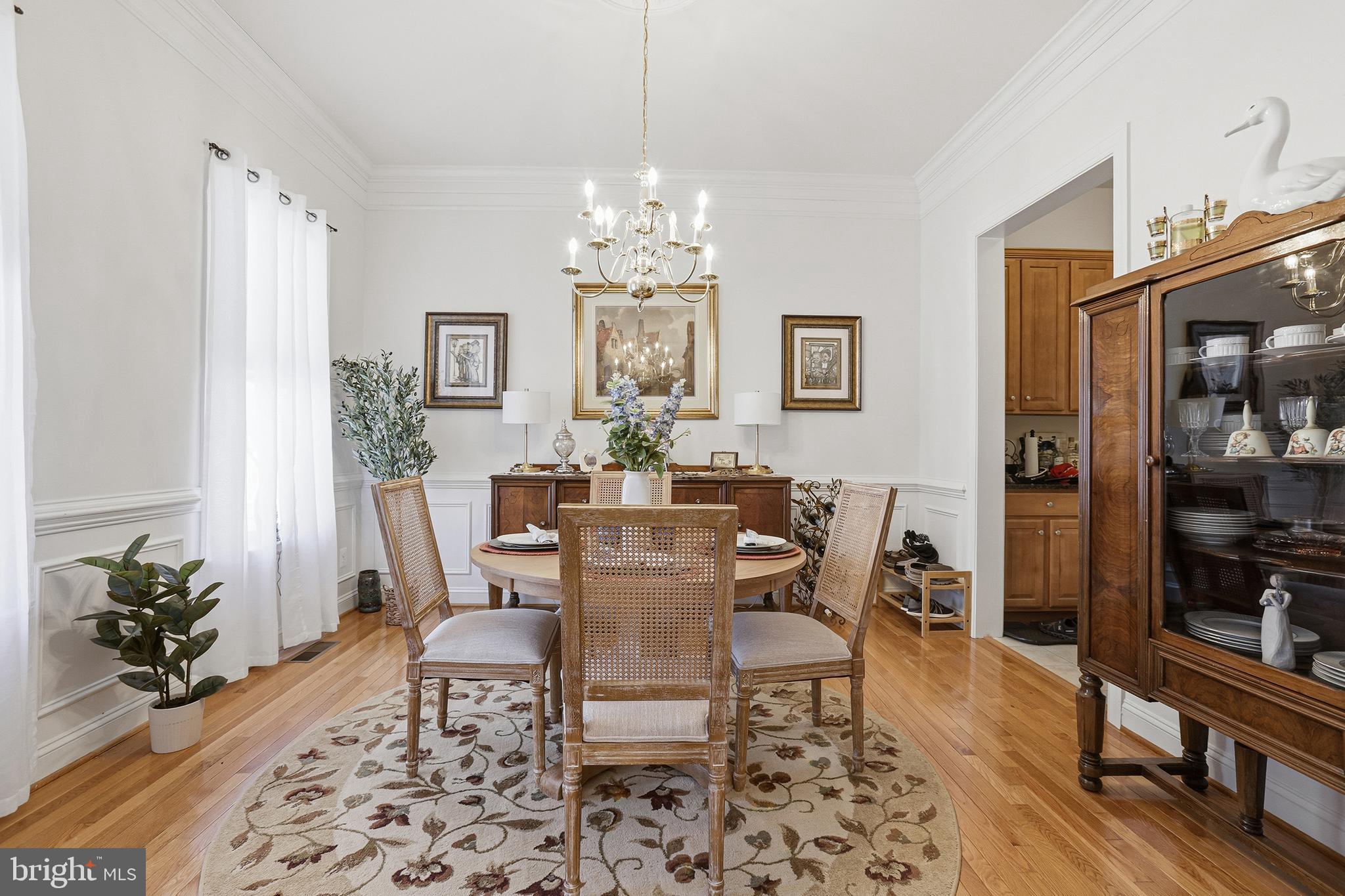 40 Branson Cove Road Hague, VA 22469 - Photo 7 of 51 a view of a dining room with furniture window and wooden floor