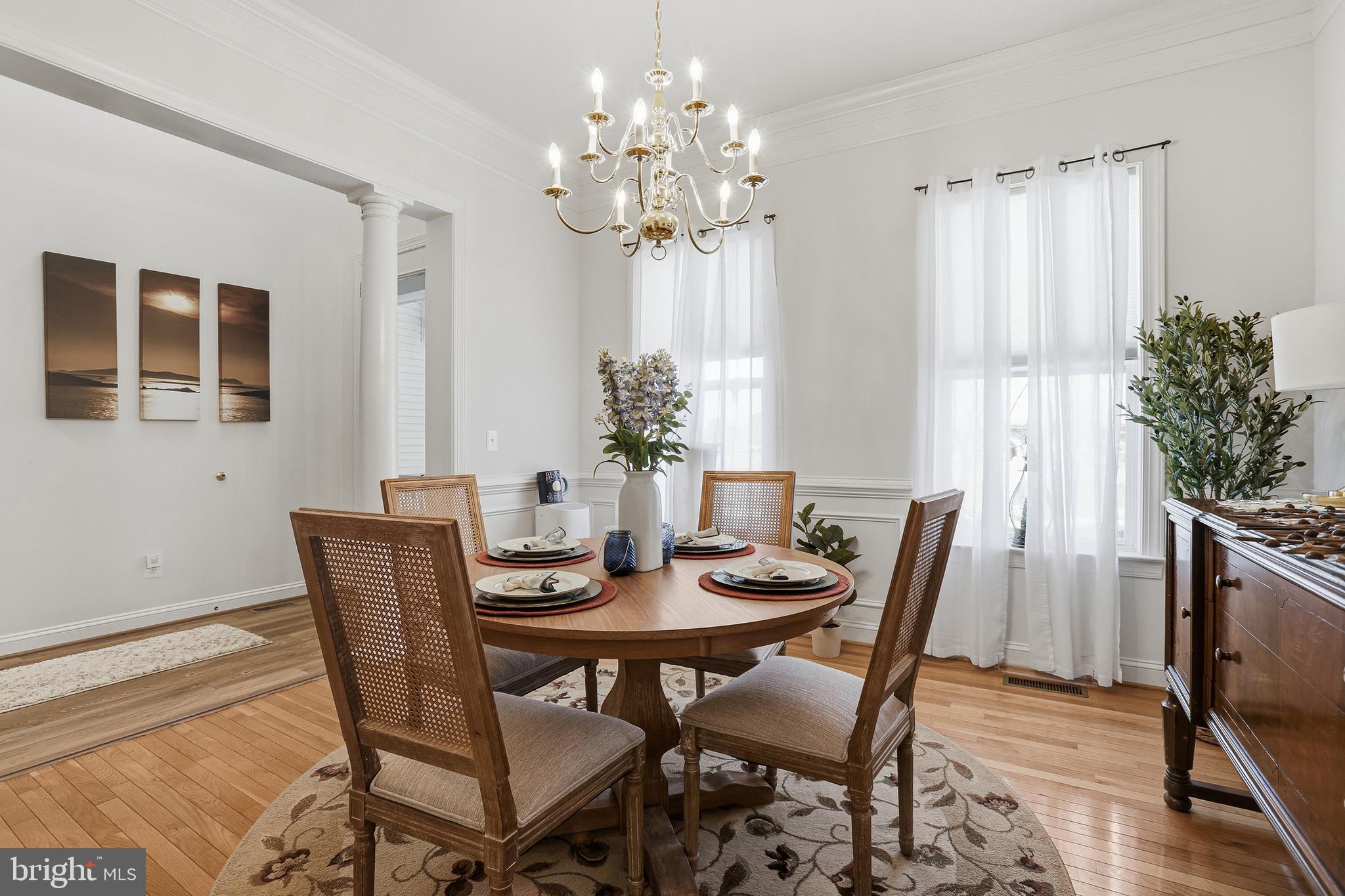 40 Branson Cove Road Hague, VA 22469 - Photo 8 of 51 a view of a dining room with furniture and chandelier