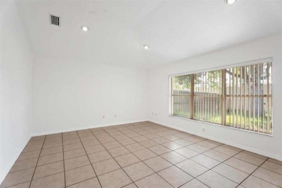 980 Windward Way St. Augustine, FL 32080 - Photo 8 of 16 a view of an empty room and window