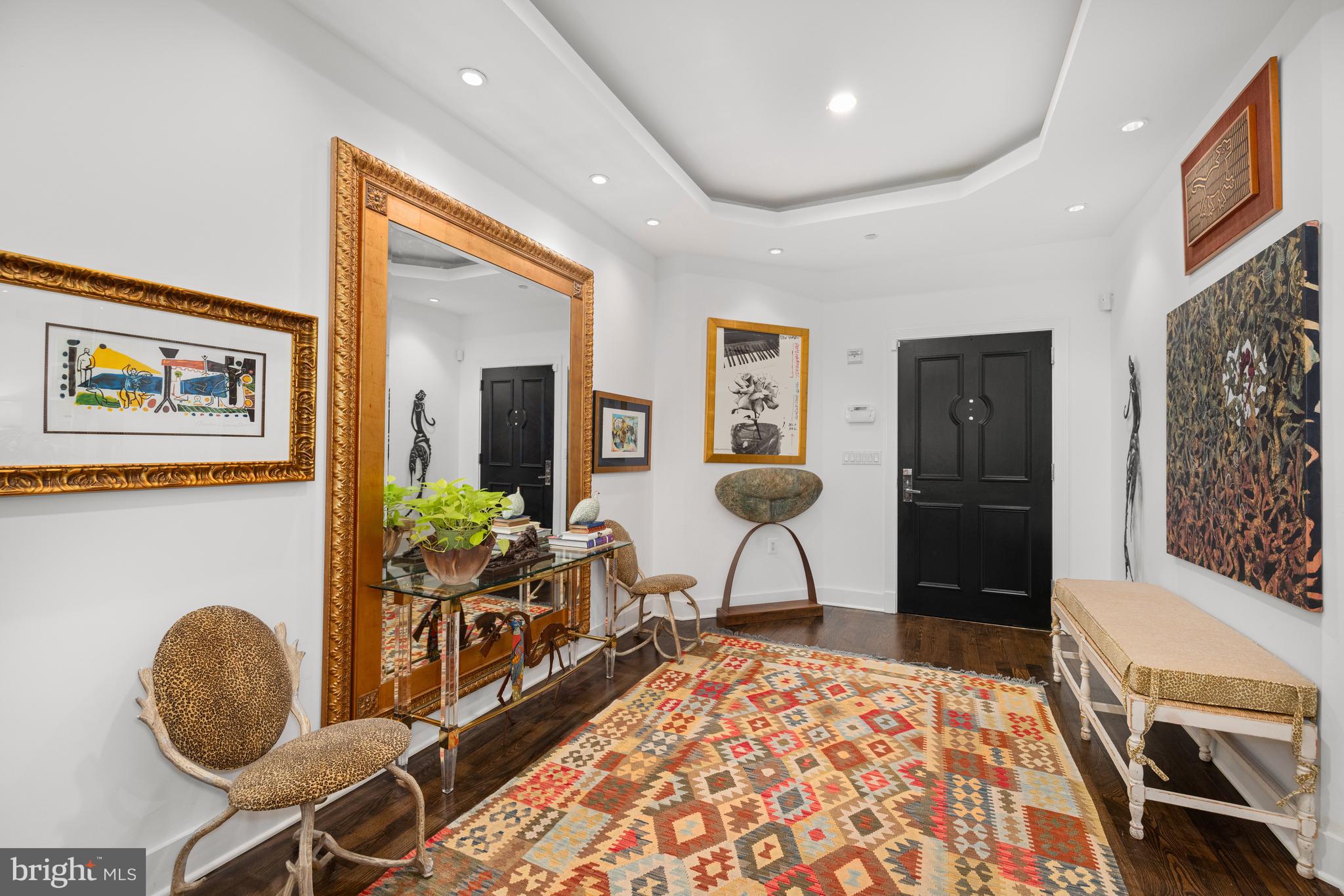 7222 47th Street, Unit R2 Bethesda, MD 20815 - Photo 3 of 26 a living room with furniture and a rug