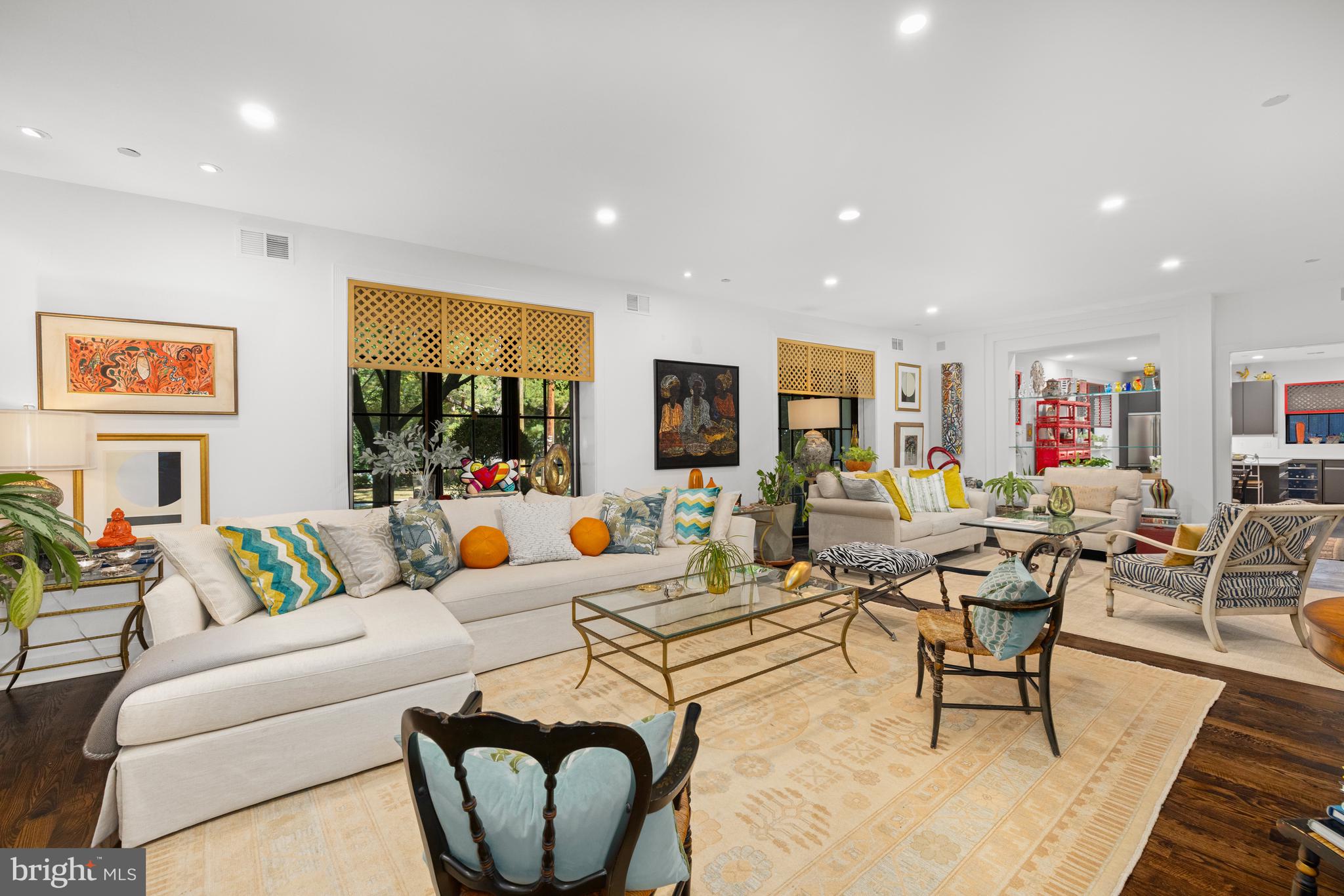 7222 47th Street, Unit R2 Bethesda, MD 20815 - Photo 6 of 26 a living room with furniture kitchen view and a large window