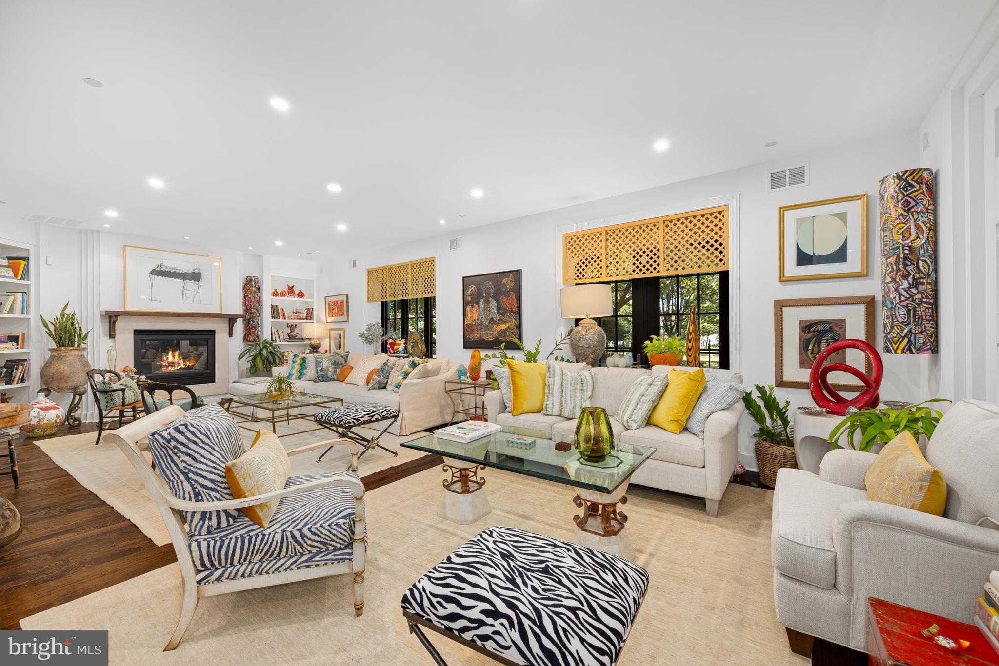 7222 47th Street, Unit R2 Bethesda, MD 20815 - Photo 7 of 26 a living room with furniture fireplace and a table