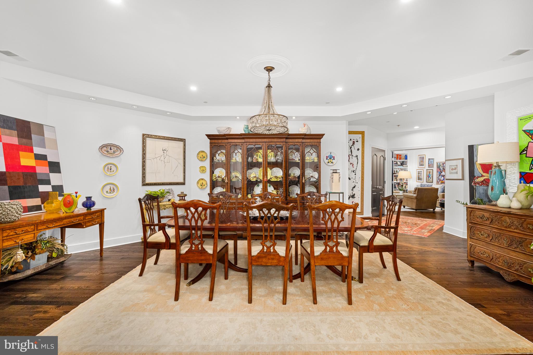 7222 47th Street, Unit R2 Bethesda, MD 20815 - Photo 9 of 26 a view of a dining room with furniture window and wooden floor