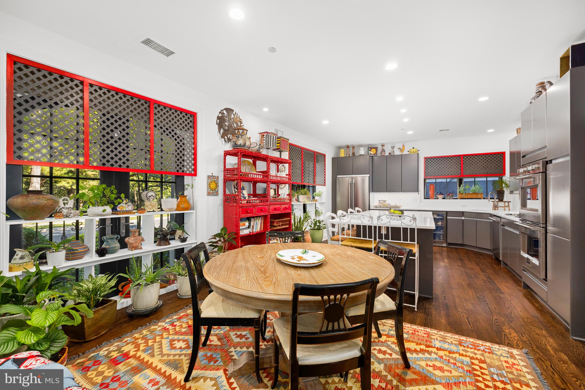 7222 47th Street, Unit R2 Bethesda, MD 20815 - Photo 10 of 26 a dining room with furniture and a floor to ceiling window