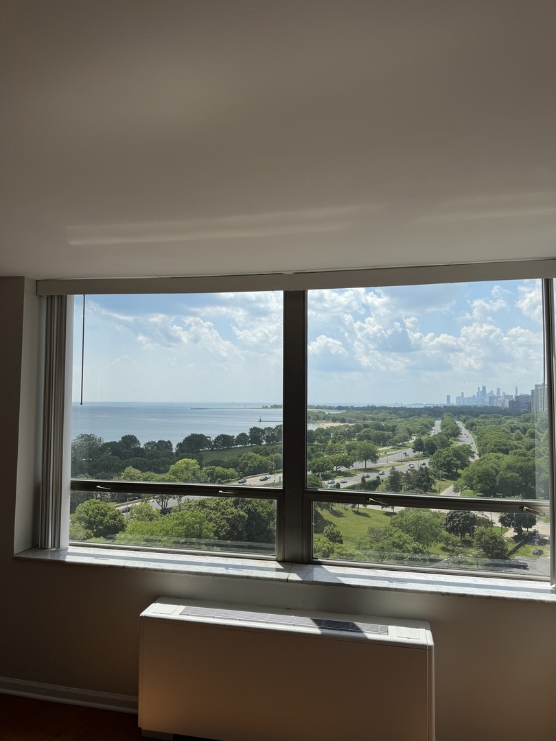 5701 North Sheridan Road, Unit 17S Chicago, IL 60660 - Photo 3 of 8 a view of a city from a window