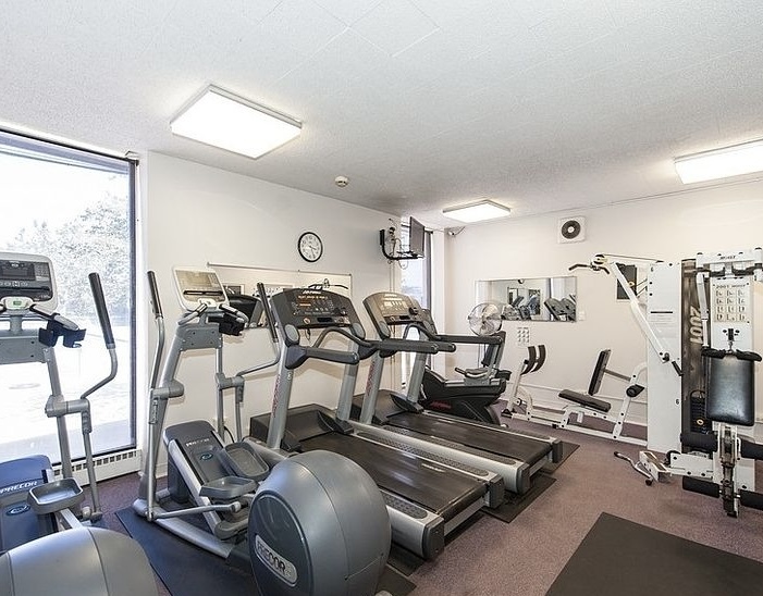 5701 North Sheridan Road, Unit 17S Chicago, IL 60660 - Photo 7 of 8 a view of a room with gym equipment