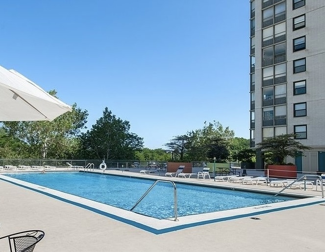 5701 North Sheridan Road, Unit 17S Chicago, IL 60660 - Photo 8 of 8 a view of swimming pool with chairs