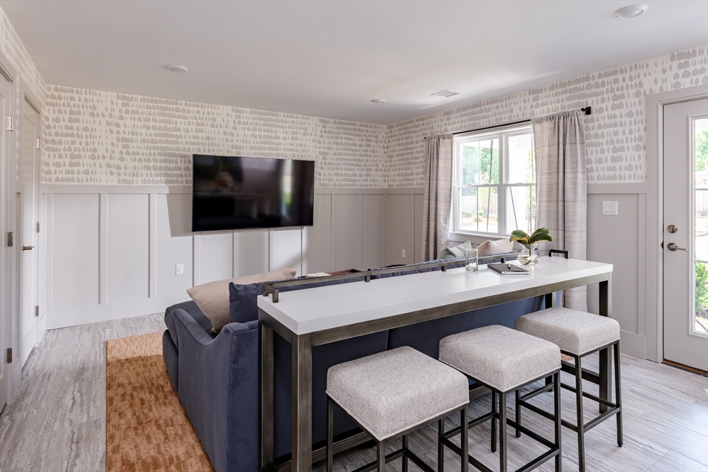 643 Church Street, Unit 122 Raynham, MA 02767 - Photo 14 of 28 a view of a dining room with furniture