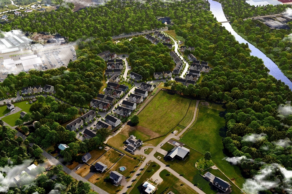 643 Church Street, Unit 122 Raynham, MA 02767 - Photo 17 of 28 an aerial view of residential houses with outdoor space