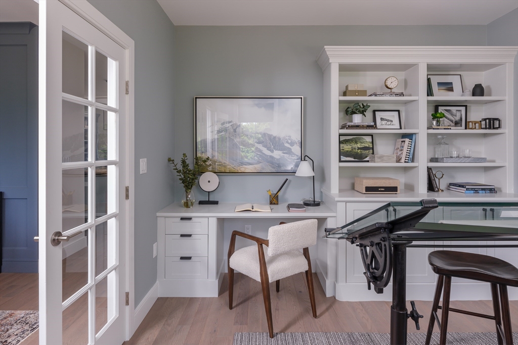 643 Church Street, Unit 122 Raynham, MA 02767 - Photo 6 of 28 a view of a workspace with furniture