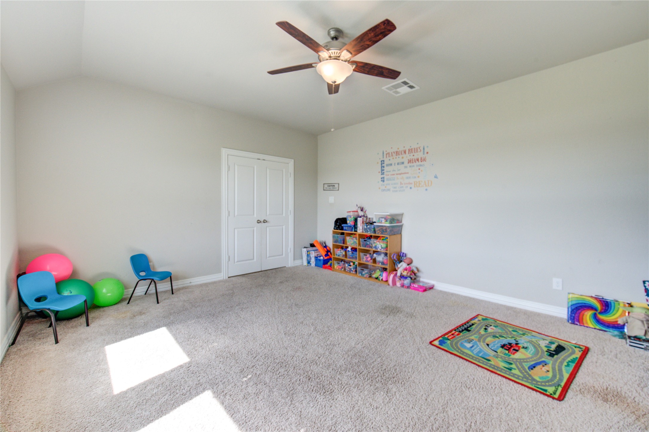 203 Lily Lane Rosharon, TX 77583 - Photo 22 of 50 a view of play room with toys and ceiling fan