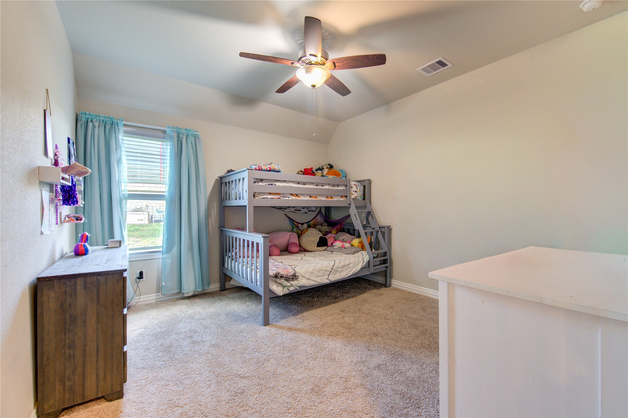 203 Lily Lane Rosharon, TX 77583 - Photo 24 of 50 a living room with furniture and a flat screen tv