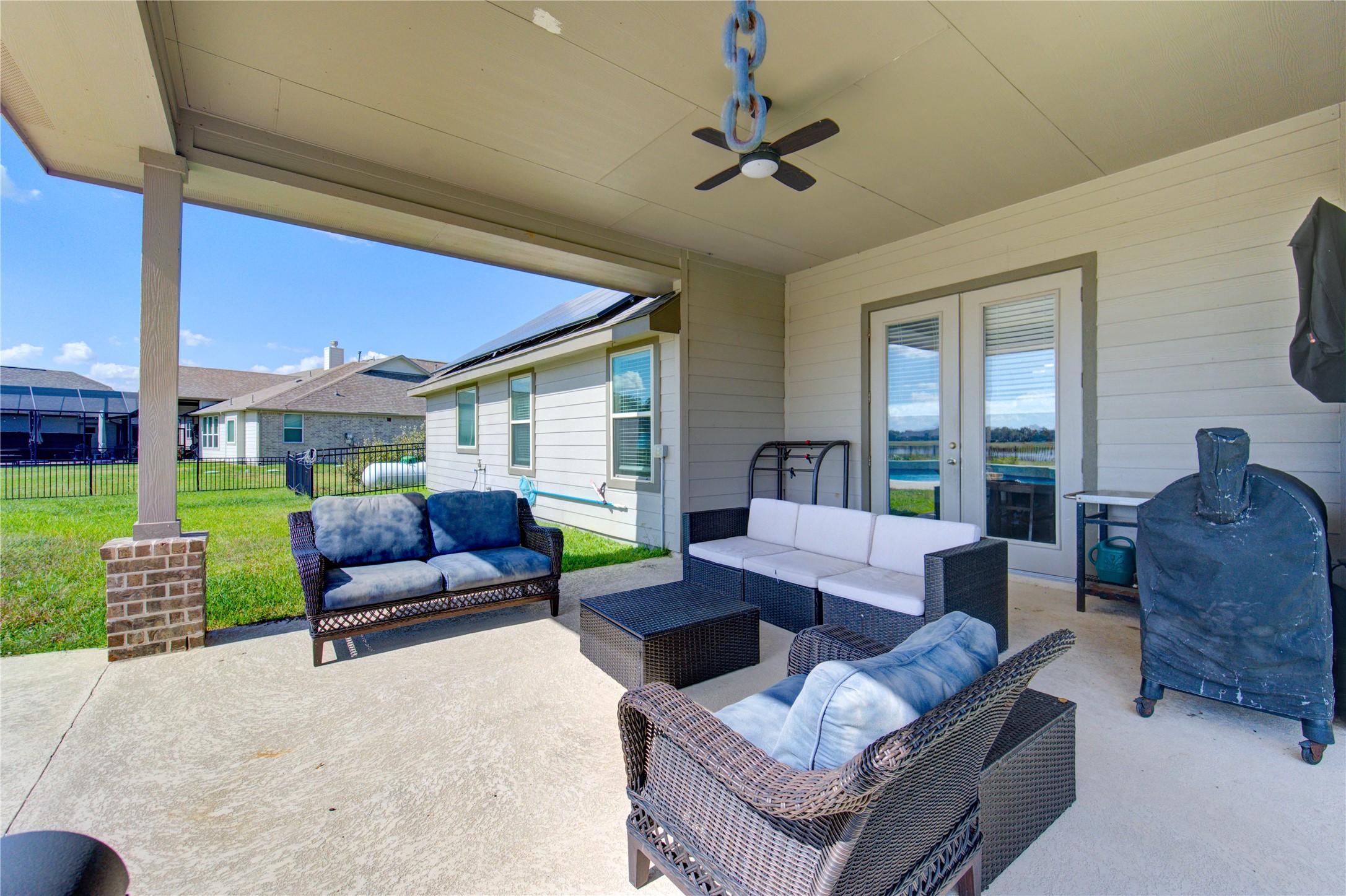 203 Lily Lane Rosharon, TX 77583 - Photo 39 of 50 a living room with furniture and a yard