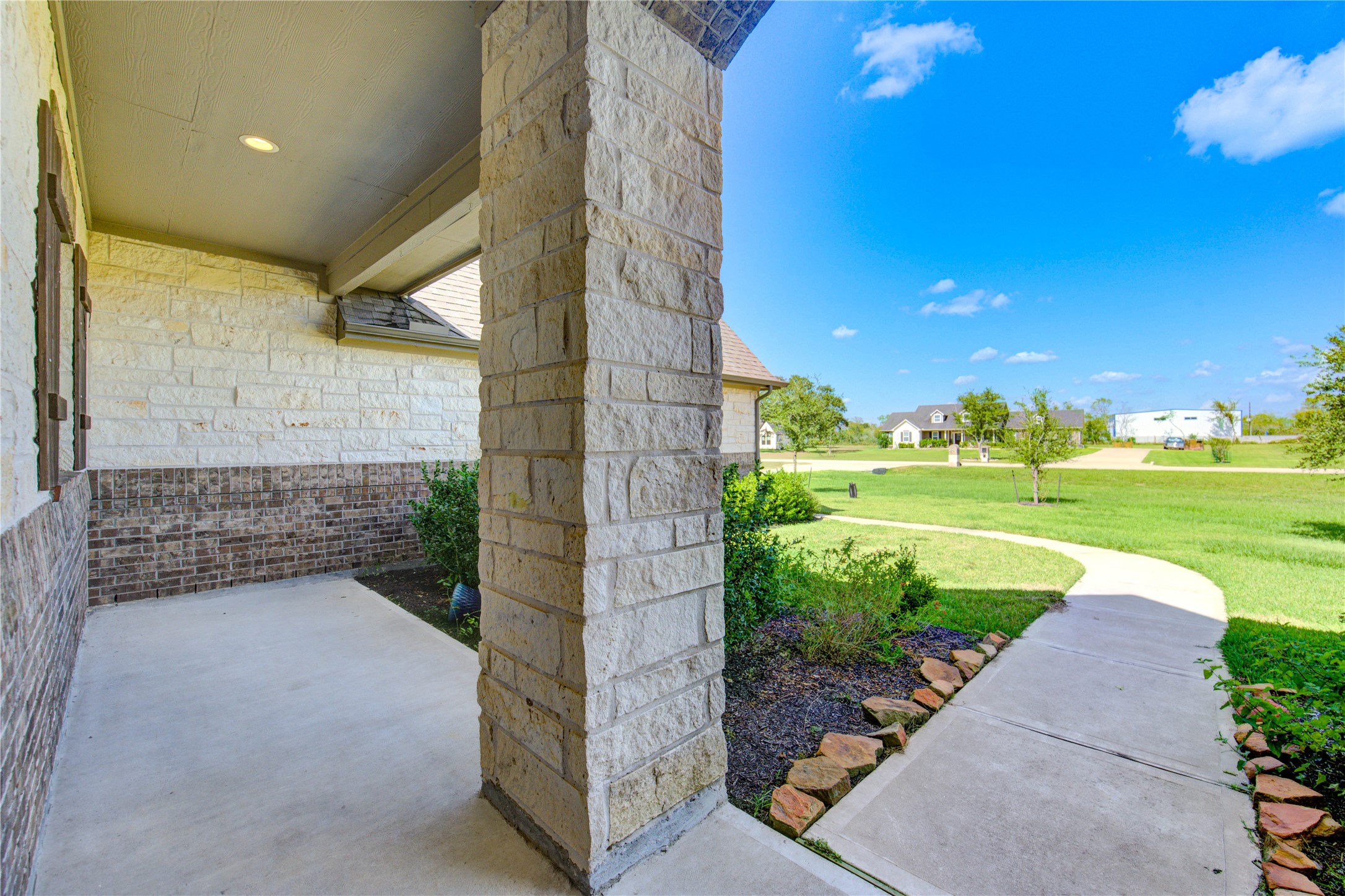 203 Lily Lane Rosharon, TX 77583 - Photo 47 of 50 a view of a pathway with a yard