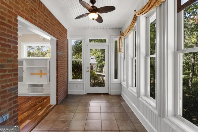 a view interior of the house with wooden floor and windows