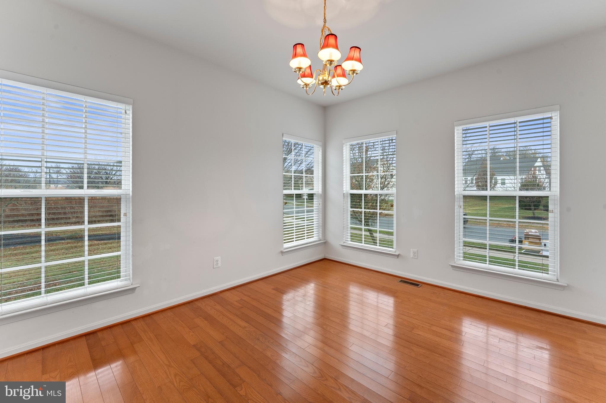 361 Pierce Run Newark, DE 19702 - Photo 13 of 32 a view of livingroom with furniture wooden floor and windows