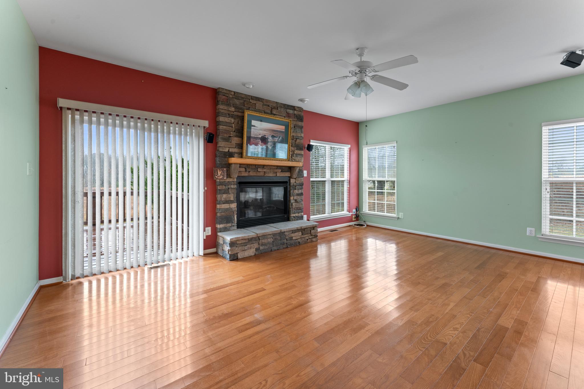 361 Pierce Run Newark, DE 19702 - Photo 15 of 32 a view of an empty room with window and wooden floor