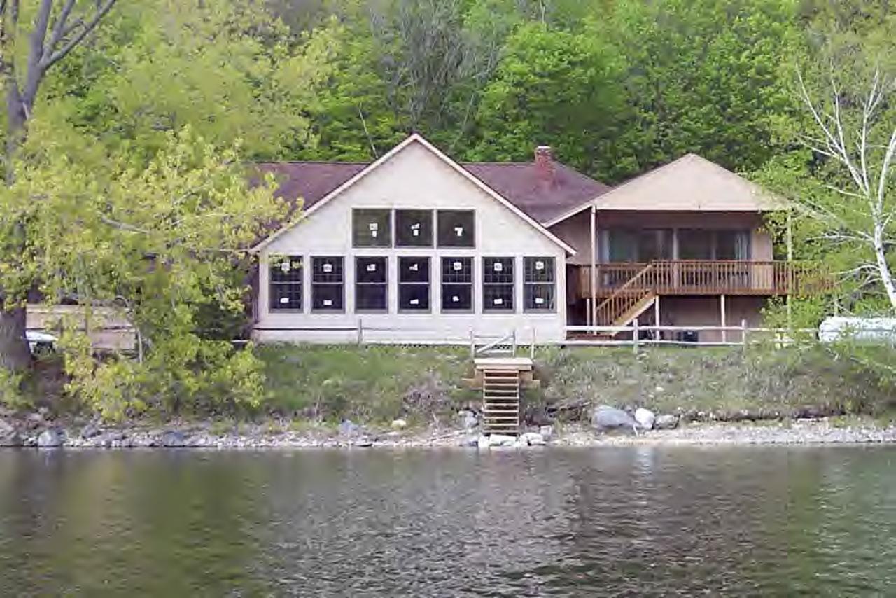 3729 Jacobs Ladder Road Becket, MA 01223 - Photo 1 of 3 a front view of a house with a yard