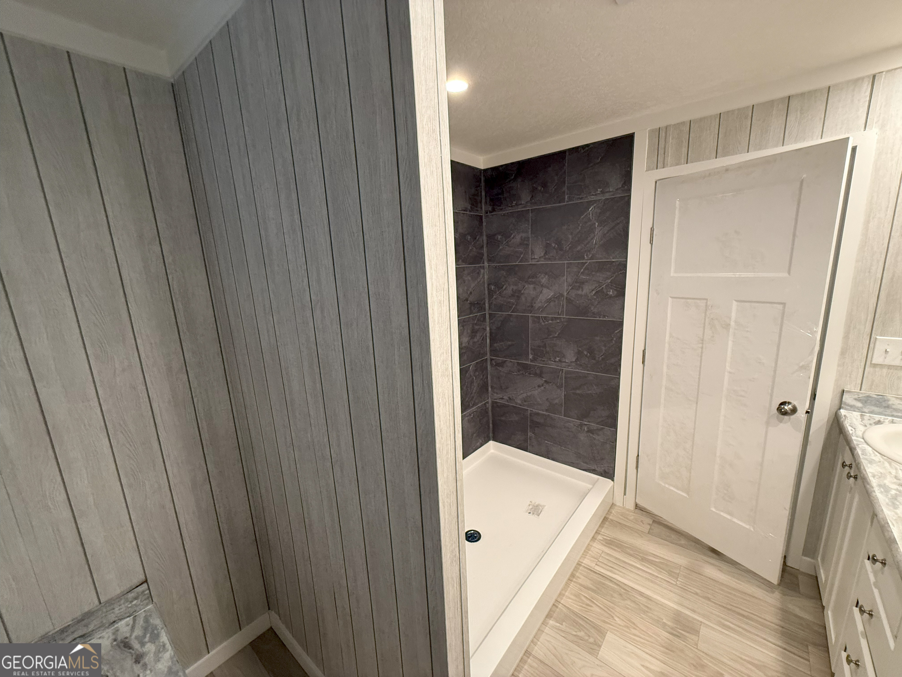 2126 Amberly Road Elberton, GA 30635 - Photo 36 of 68 a bathroom with a bathtub and a shower