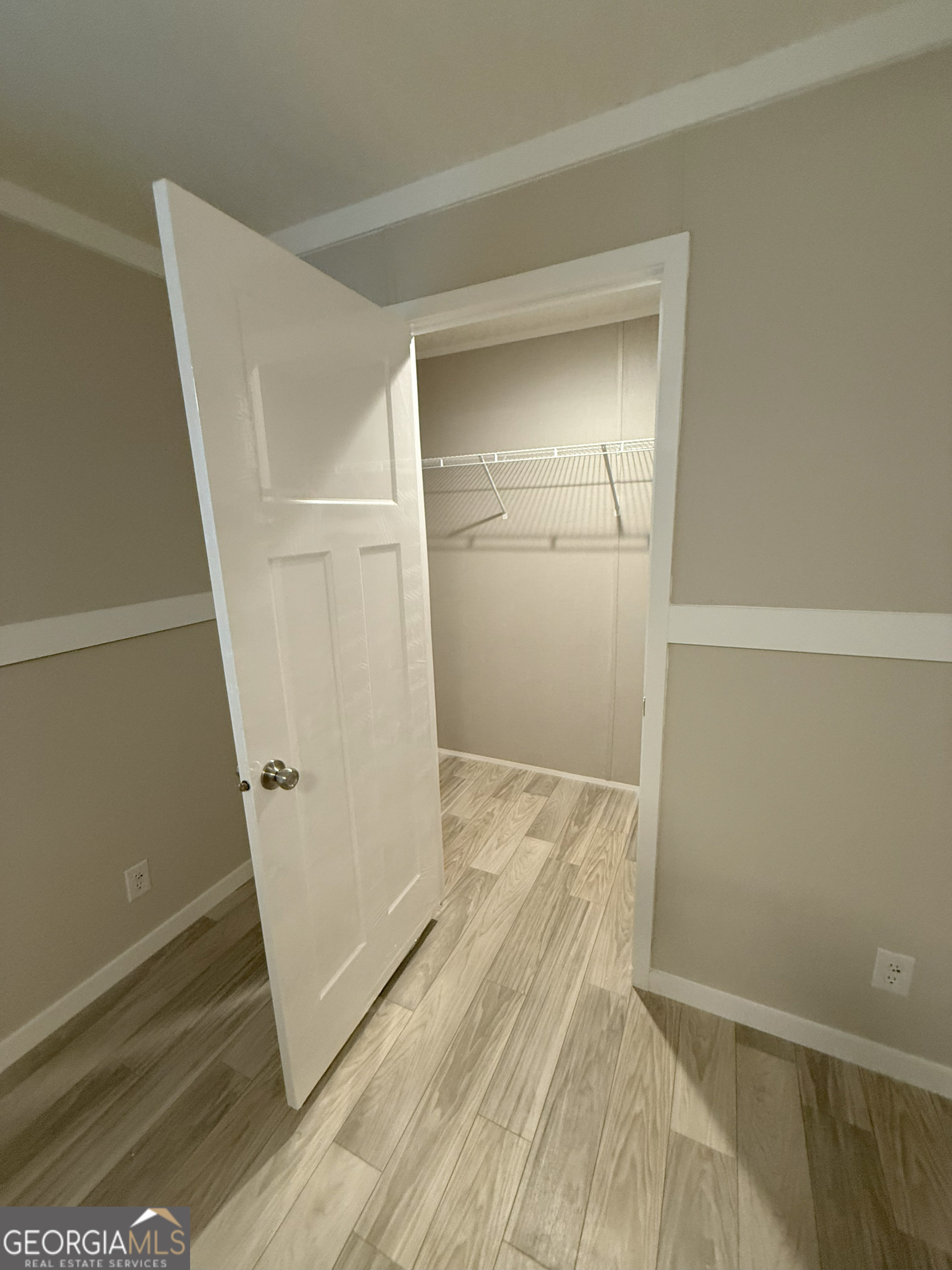 2126 Amberly Road Elberton, GA 30635 - Photo 40 of 68 a view of empty room with wooden floor