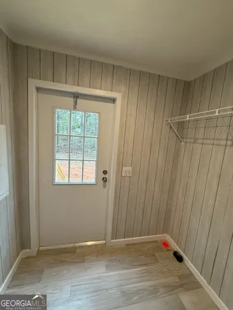 a kitchen with stainless steel appliances a stove a sink and a microwave