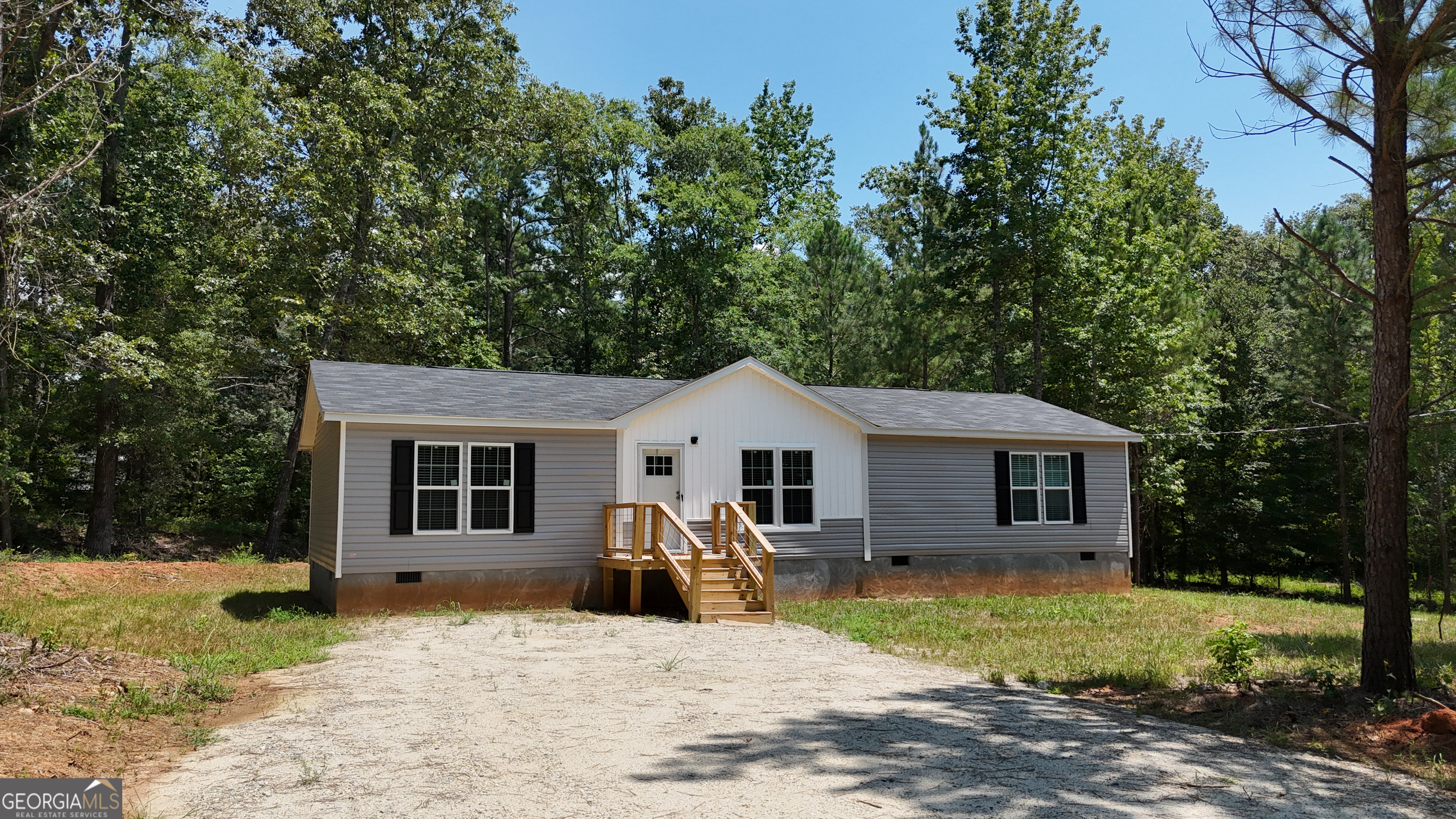 2126 Amberly Road Elberton, GA 30635 - Photo 61 of 68 a front view of a house with a yard