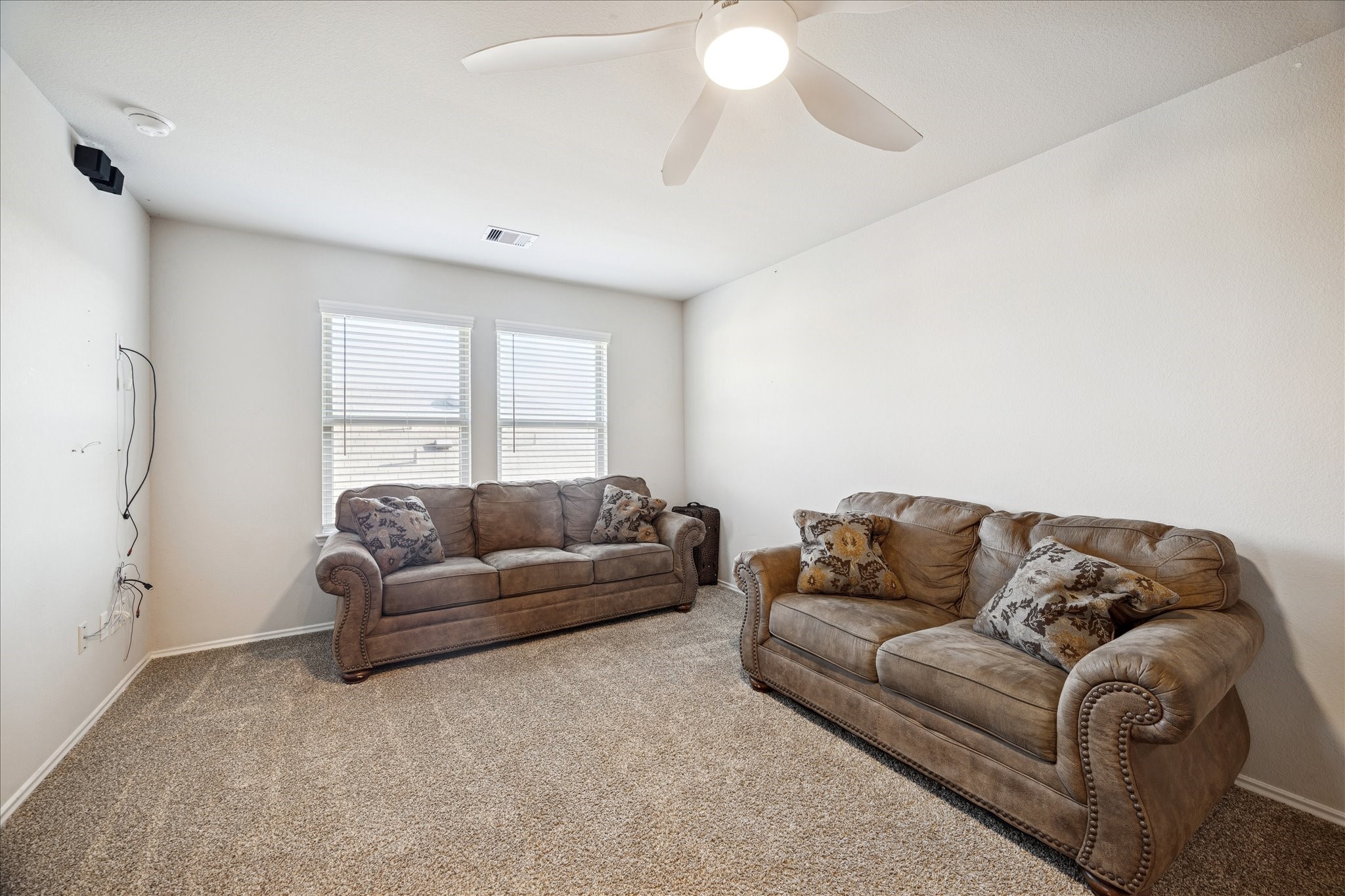 23703 Harrow Field Ln Spring Spring, TX 77373 - Photo 5 of 9 a living room with a couch and a window
