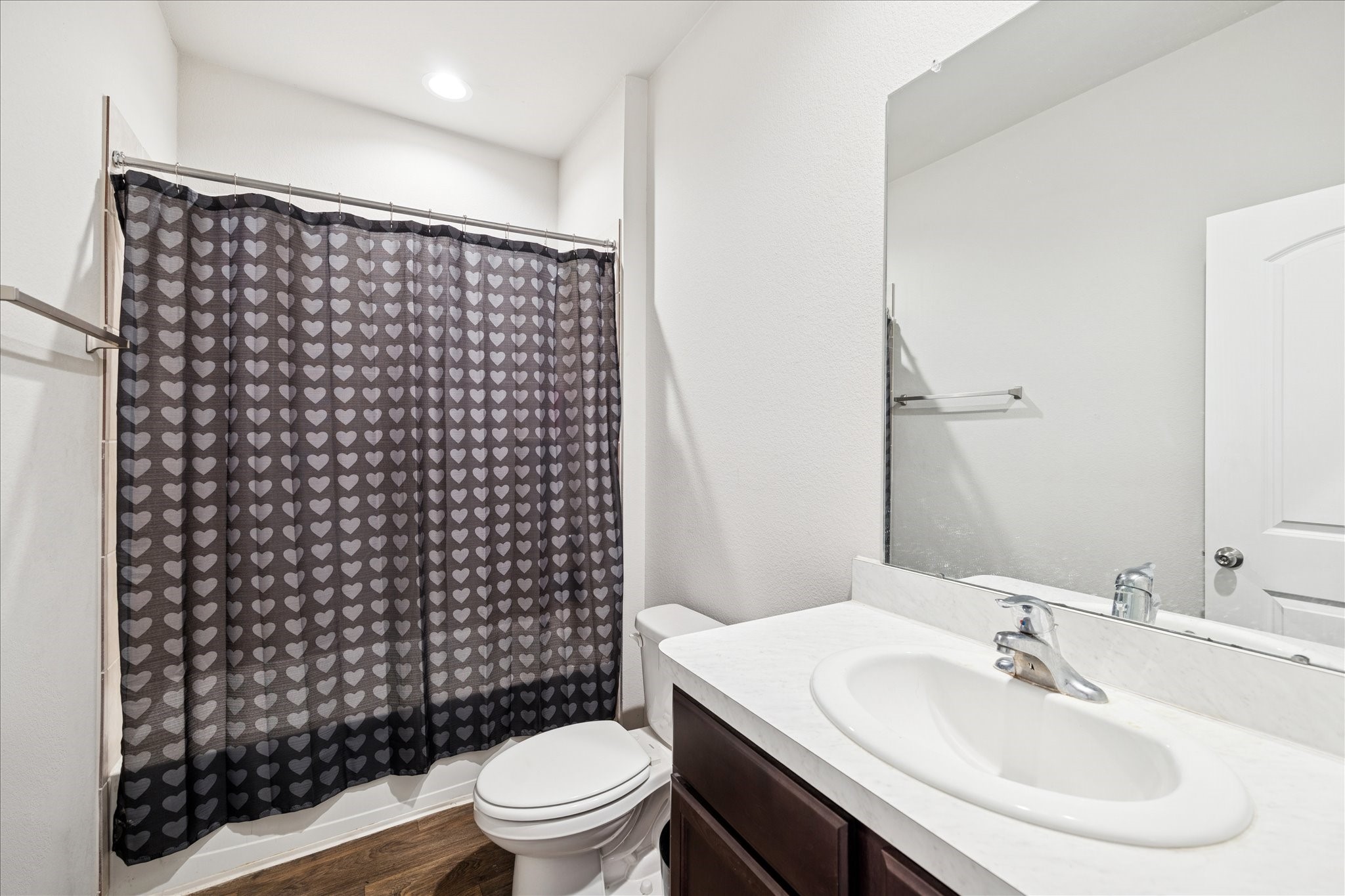 23703 Harrow Field Ln Spring Spring, TX 77373 - Photo 8 of 9 a bathroom with a sink toilet and shower