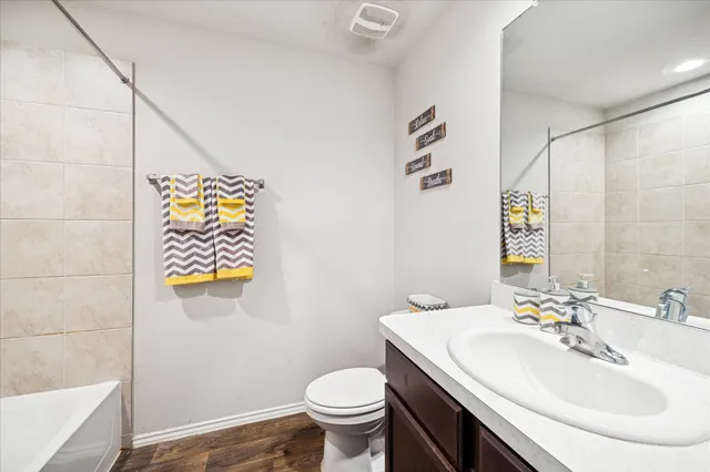 a bathroom with a sink and a toilet